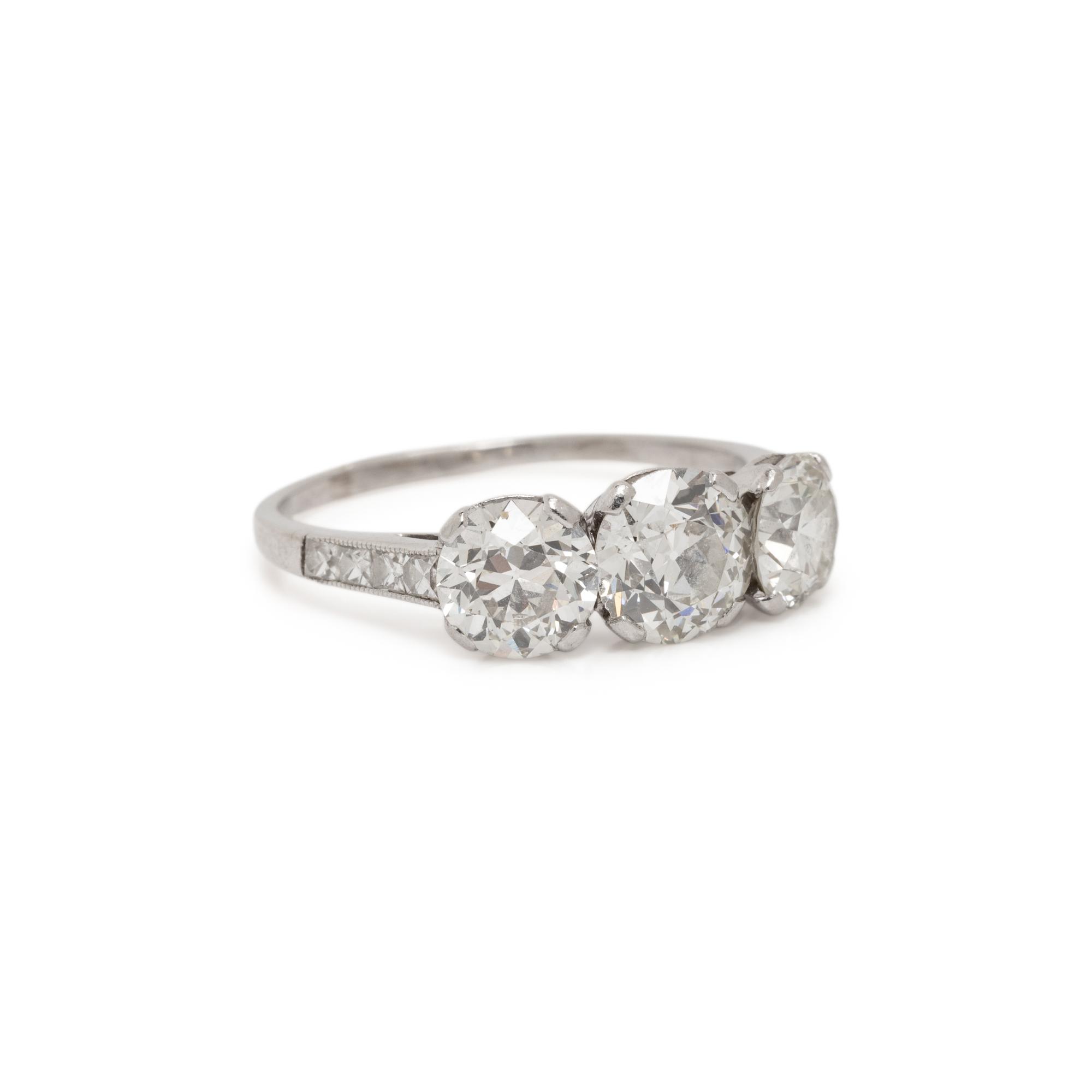 ANTIQUE, THREE STONE DIAMOND AND PLATINUM RING