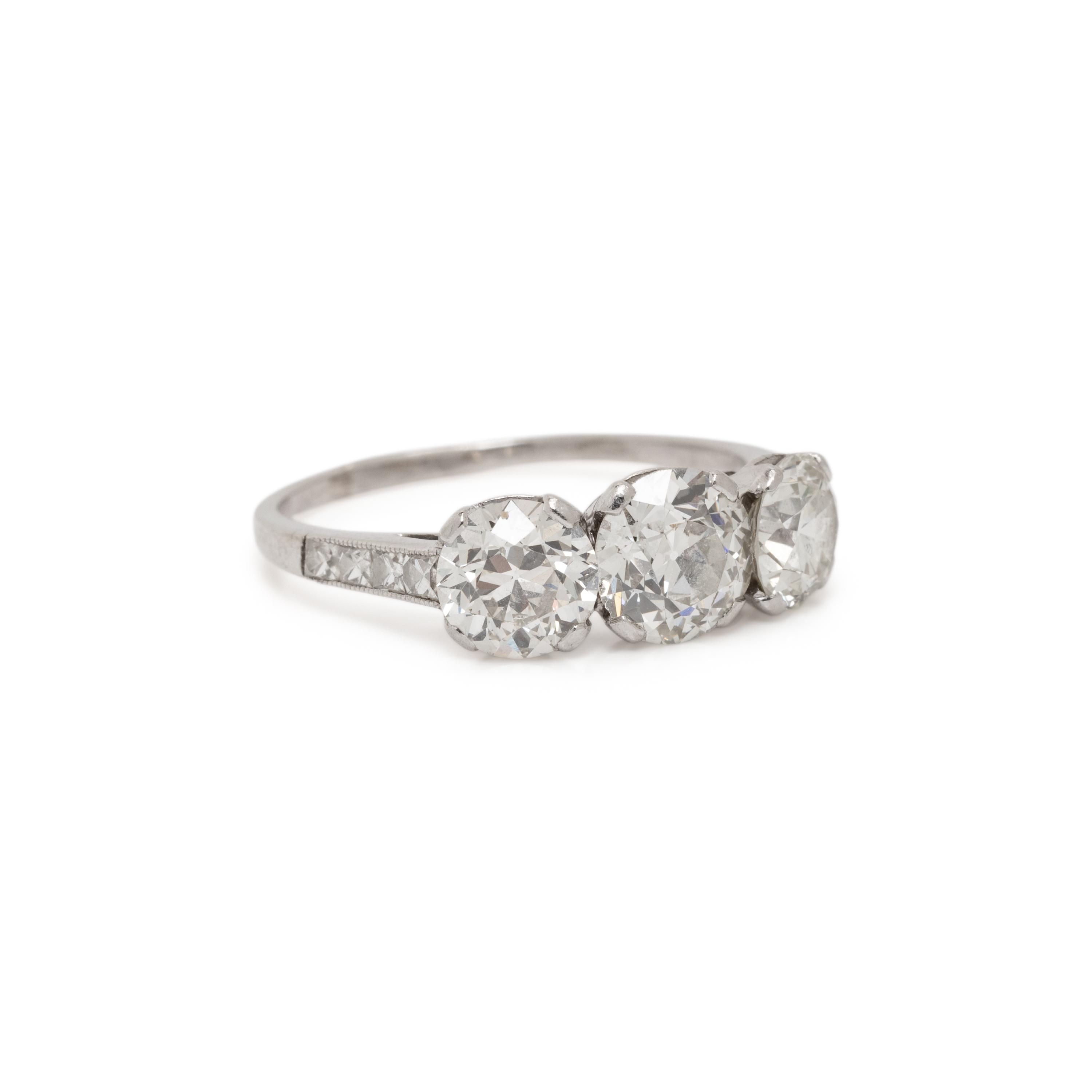 ANTIQUE, THREE STONE DIAMOND AND PLATINUM RING