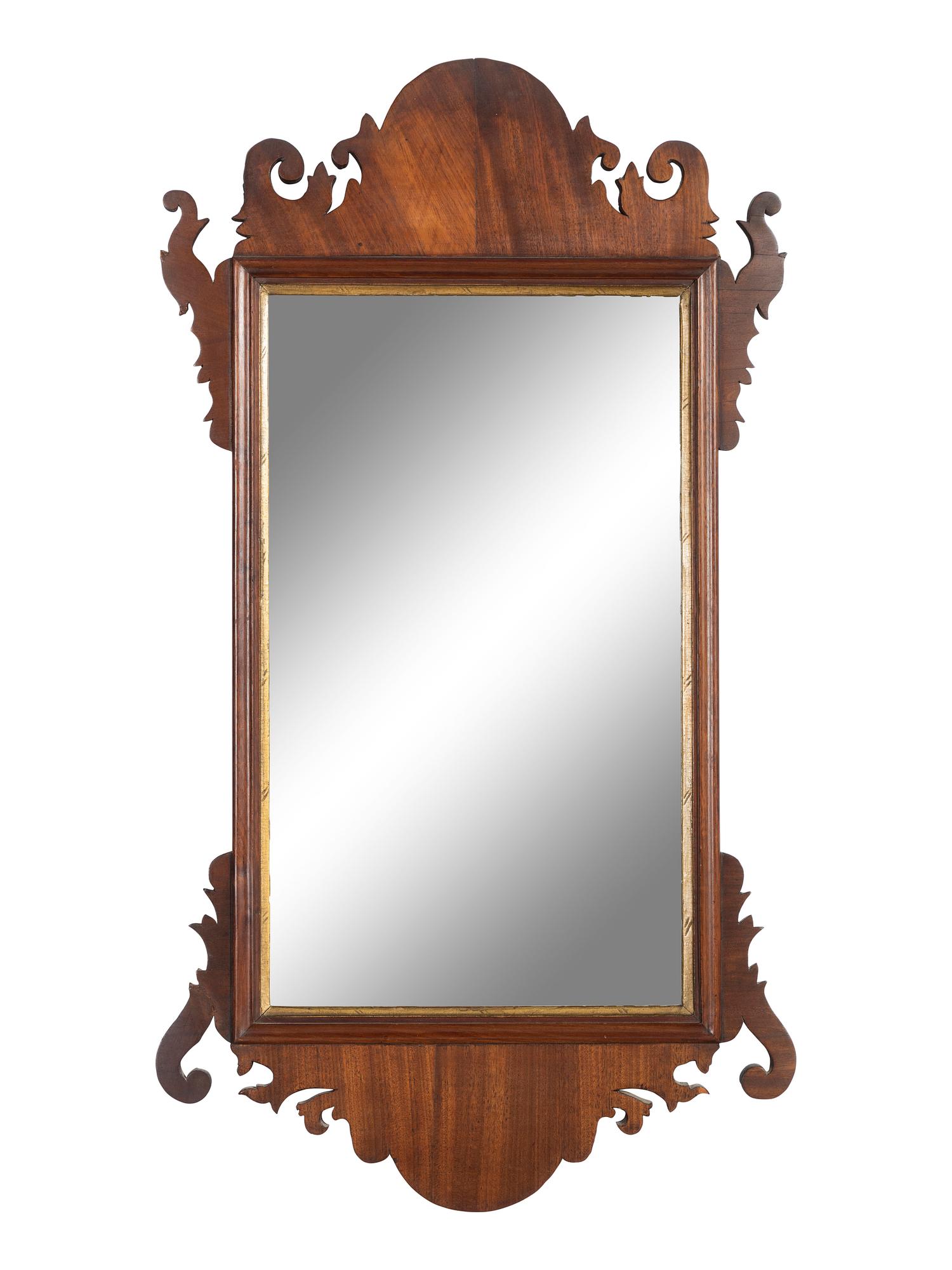 A Chippendale Carved Mahogany and Parcel Gilt Mirror
