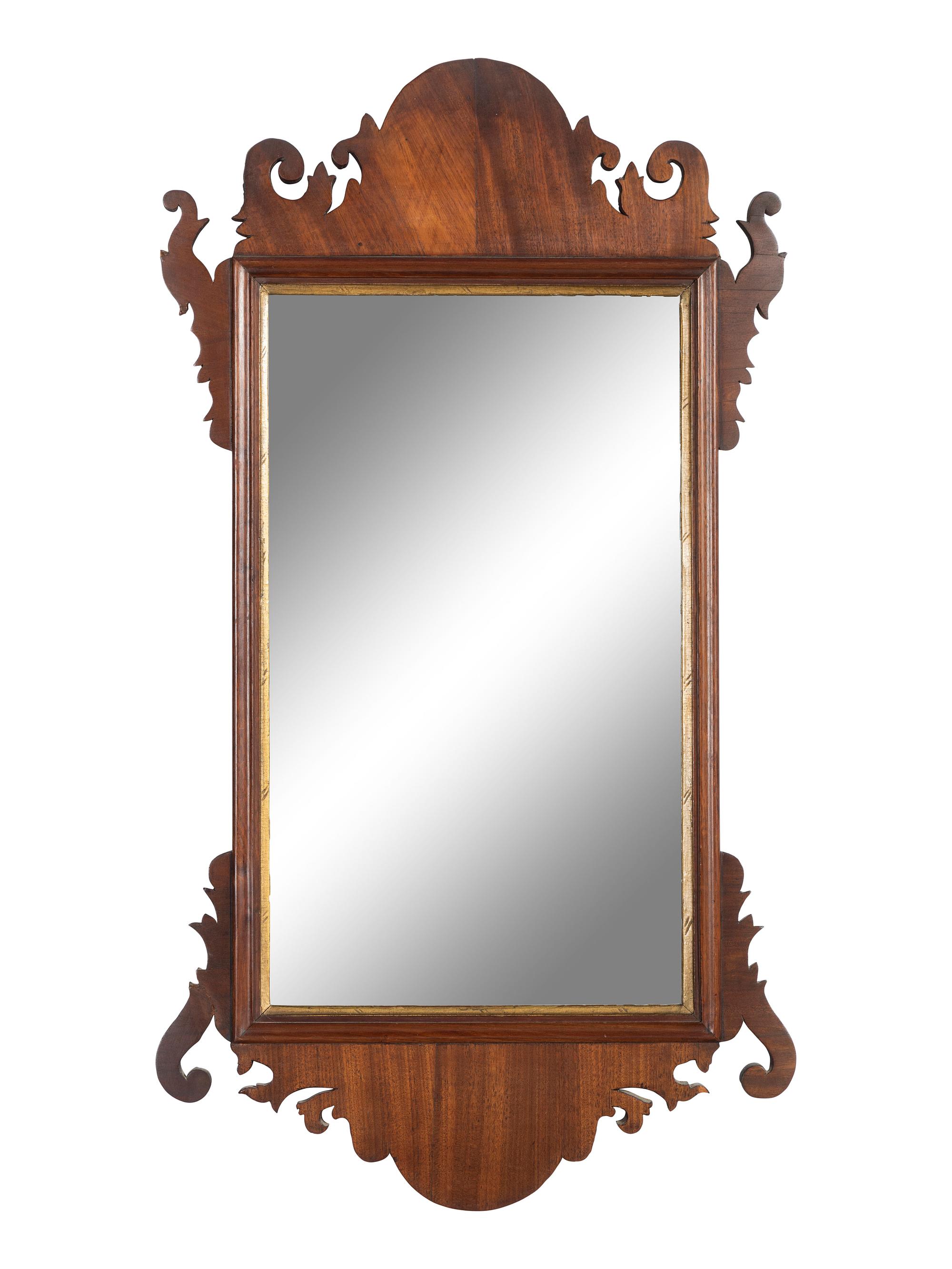 A Chippendale Carved Mahogany and Parcel Gilt Mirror