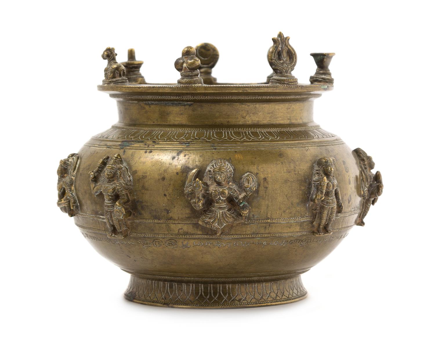 An Indian Bronze Offering Bowl Height 5 x diameter 6 1/4 inches.