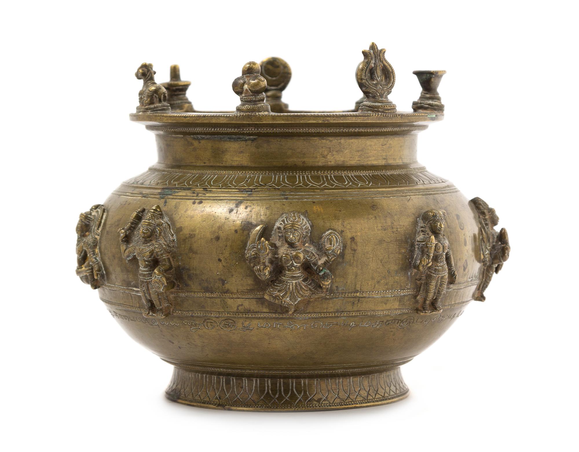 An Indian Bronze Offering Bowl Height 5 x diameter 6 1/4 inches.