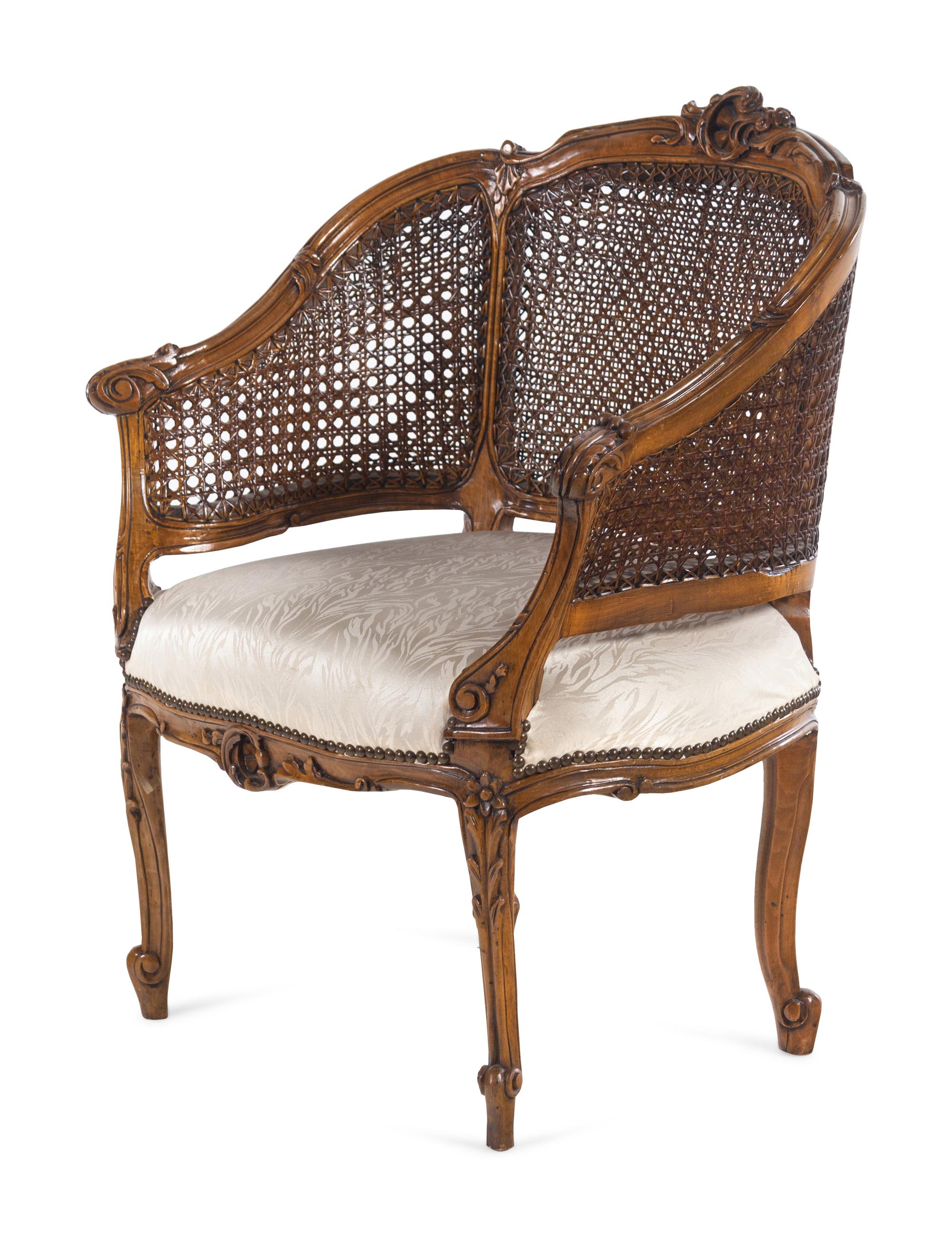 A Louis XV Style Beechwood Caned Bergère