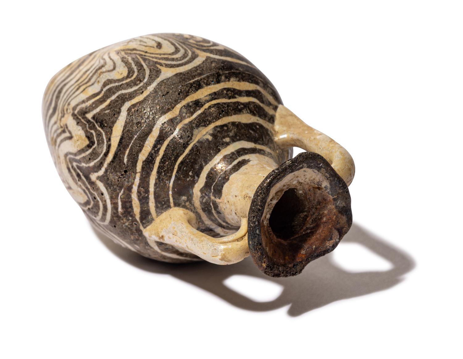 An Eastern Mediterranean Brown and White Core-Formed Amphora