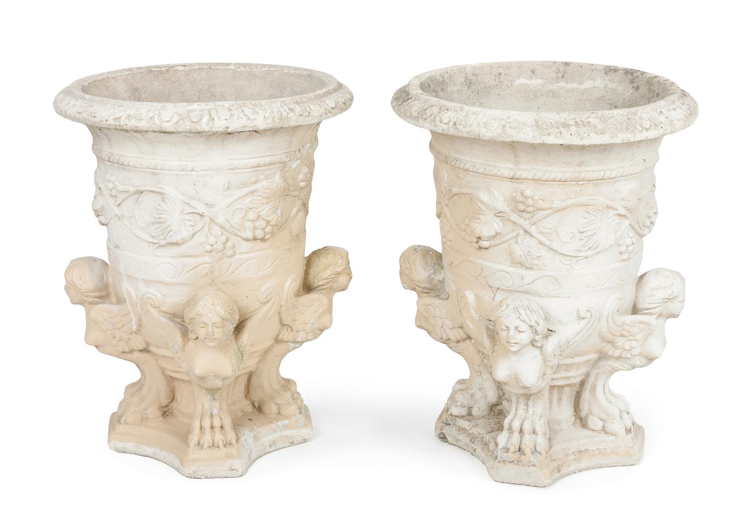 A Pair of Cast Stone Jardinieres Height 19 1/4 inches.
