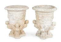 A Pair of Cast Stone Jardinieres Height 19 1/4 inches.