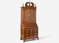 A Chippendale Carved Cherrywood Desk and Bookcase
