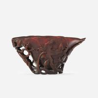 A Chinese Carved Rhinoceros Horn Libation Cup 17th/18th century
