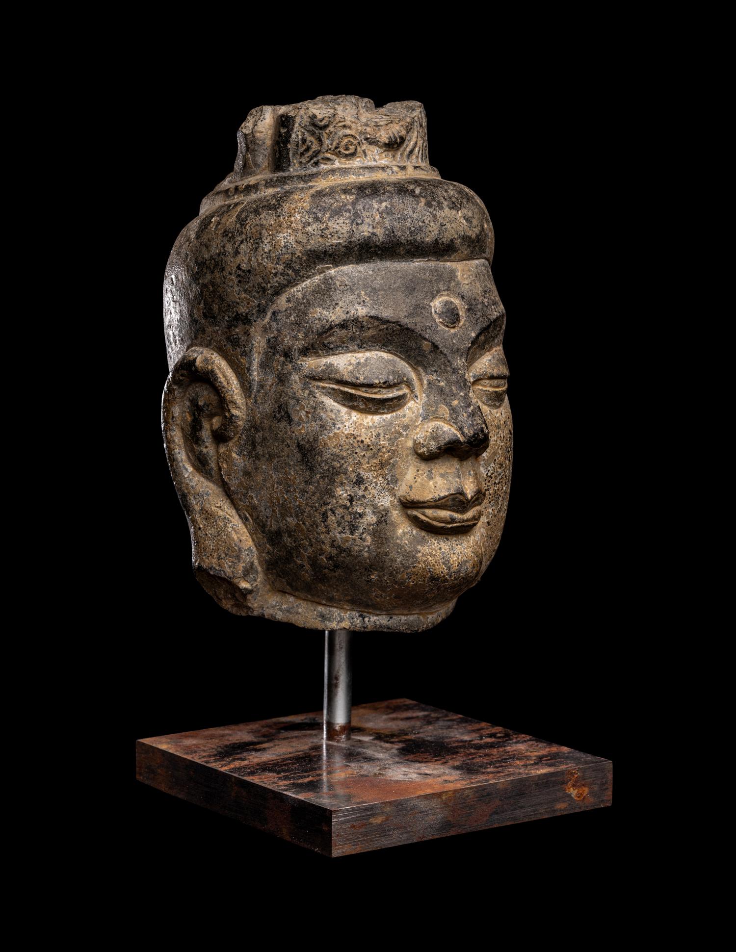 A Chinese Carved Stone Head of Buddha