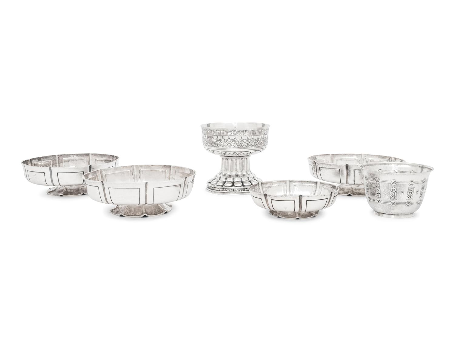 A Group of Six English Arts and Crafts Silver Table Articles