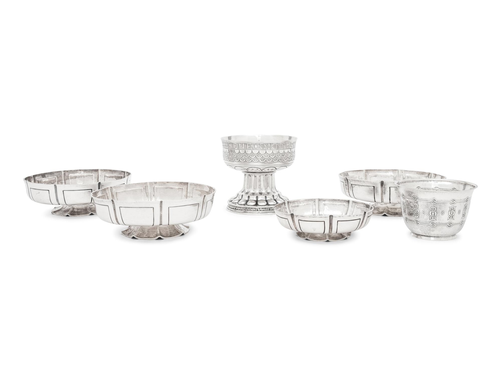 A Group of Six English Arts and Crafts Silver Table Articles
