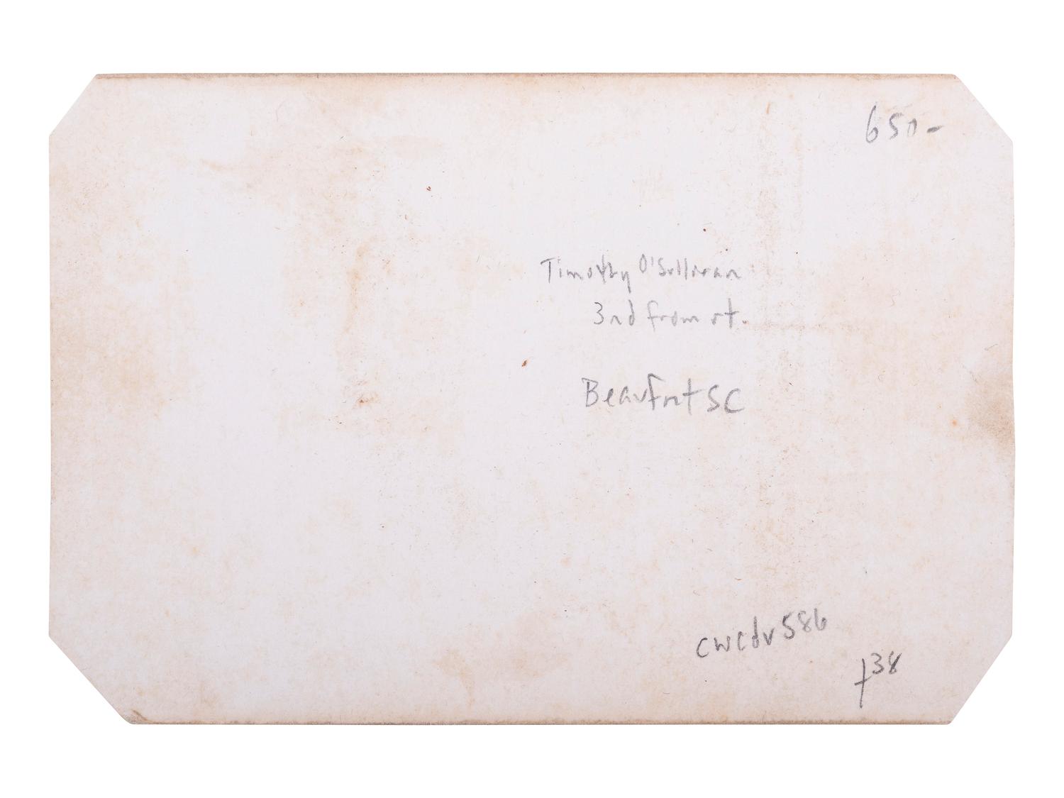 [CIVIL WAR]. O'SULLIVAN, Timothy, photographer. CDV of group of men at Beaufort, SC, possibly including Timothy O'Sullivan, and African American subjects. Washington, DC: M.B. Brady, 1862.