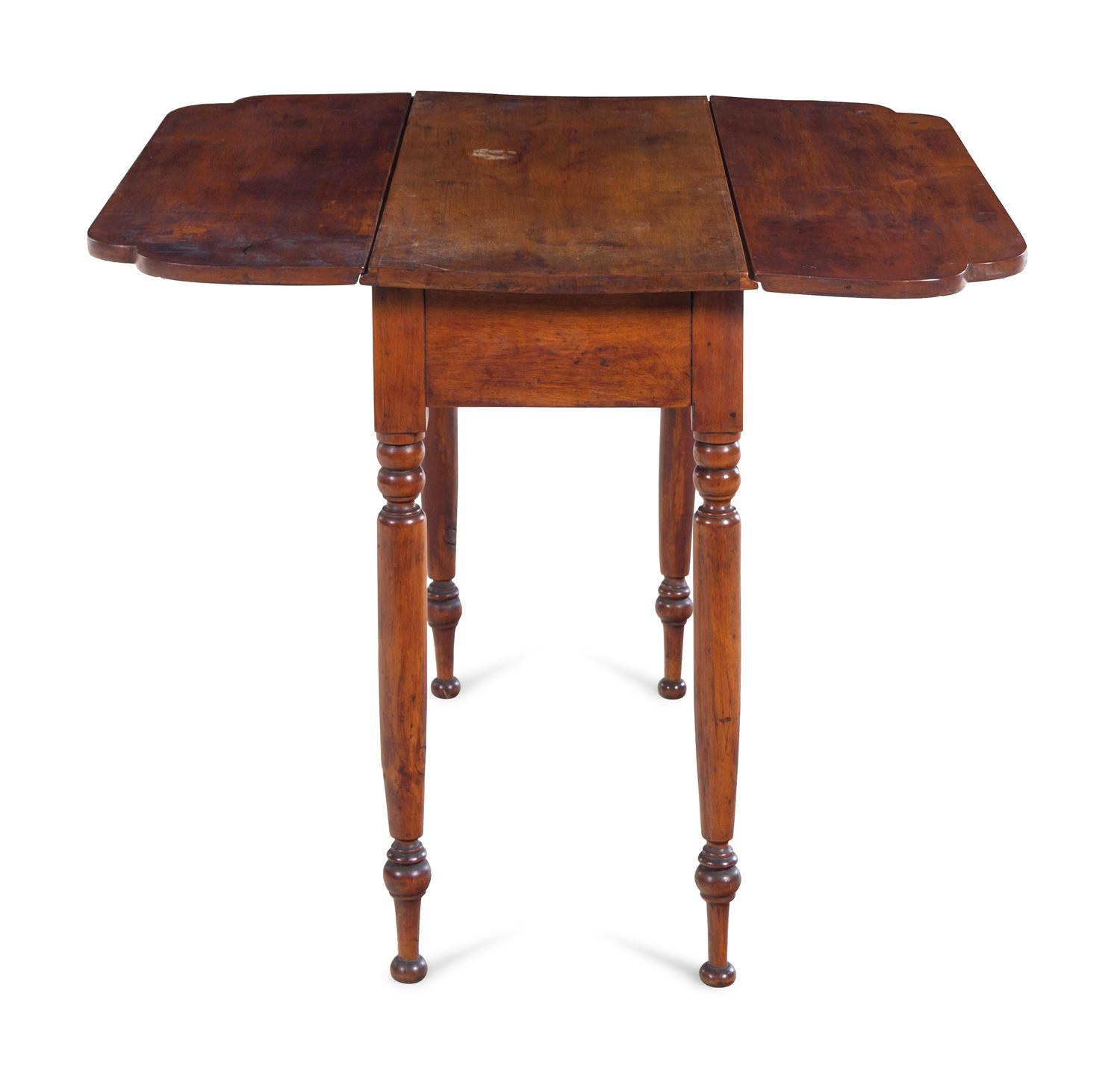 A Late Federal Cherrywood and Maple Drop Leaf Table