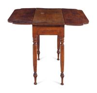 A Late Federal Cherrywood and Maple Drop Leaf Table