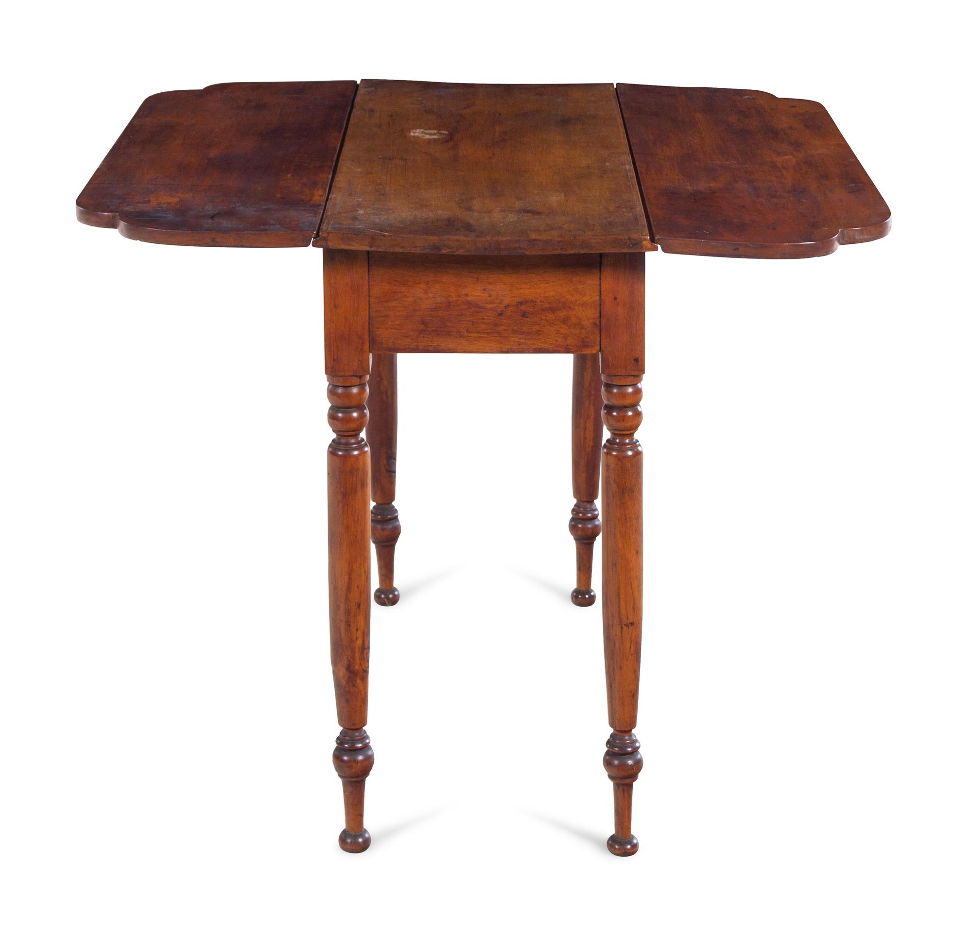 A Late Federal Cherrywood and Maple Drop Leaf Table