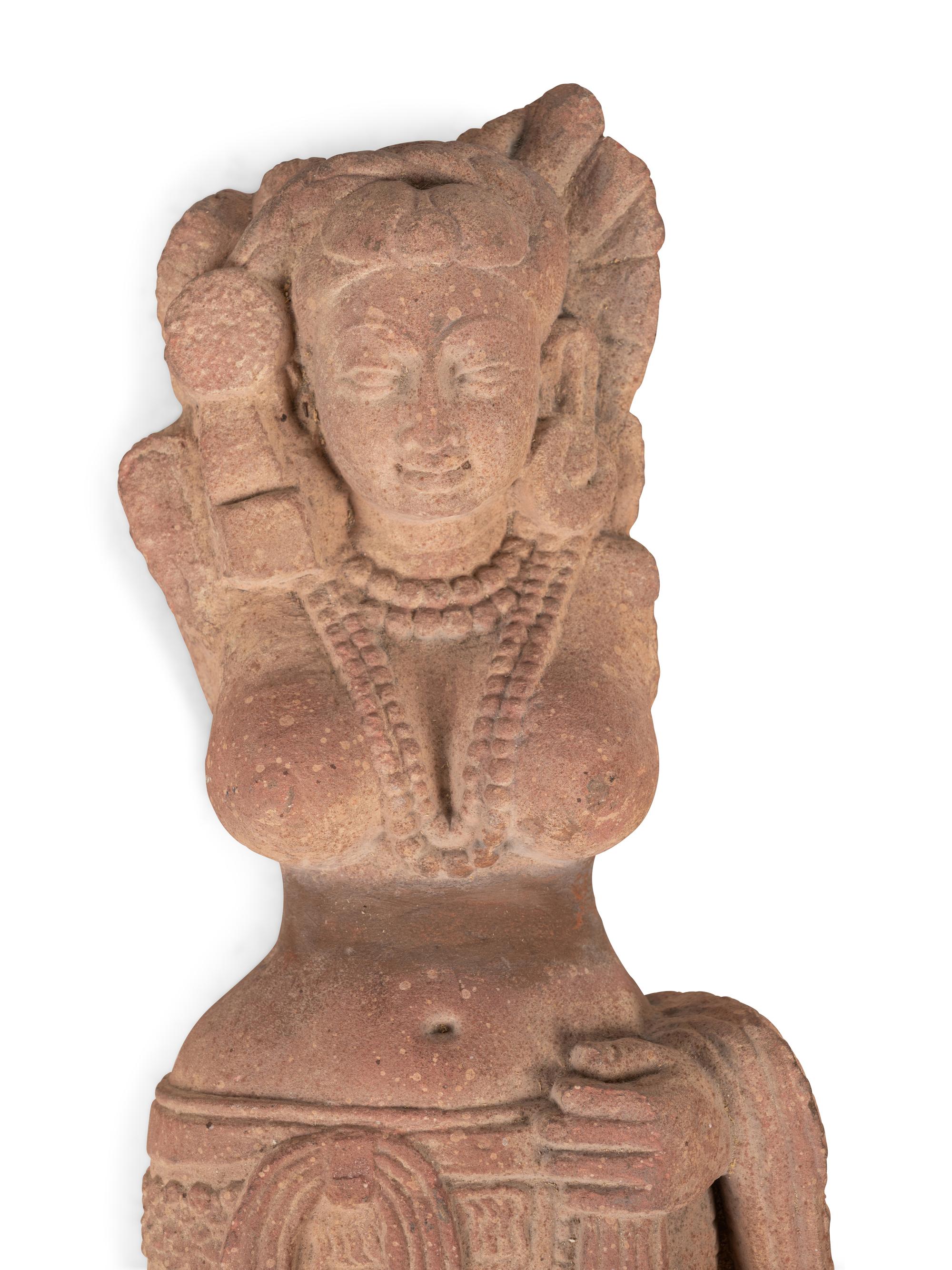 An Indian Carved Sandstone Figure of a Goddess