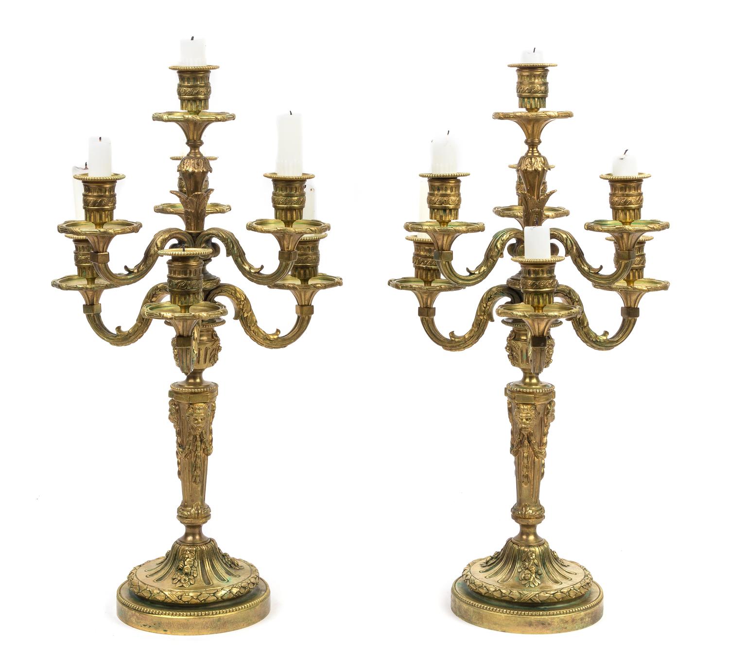 A Pair of Louis XVI Style Gilt Bronze Seven-Light Candelabra Height 20 3/4 inches. — 19TH CENTURY