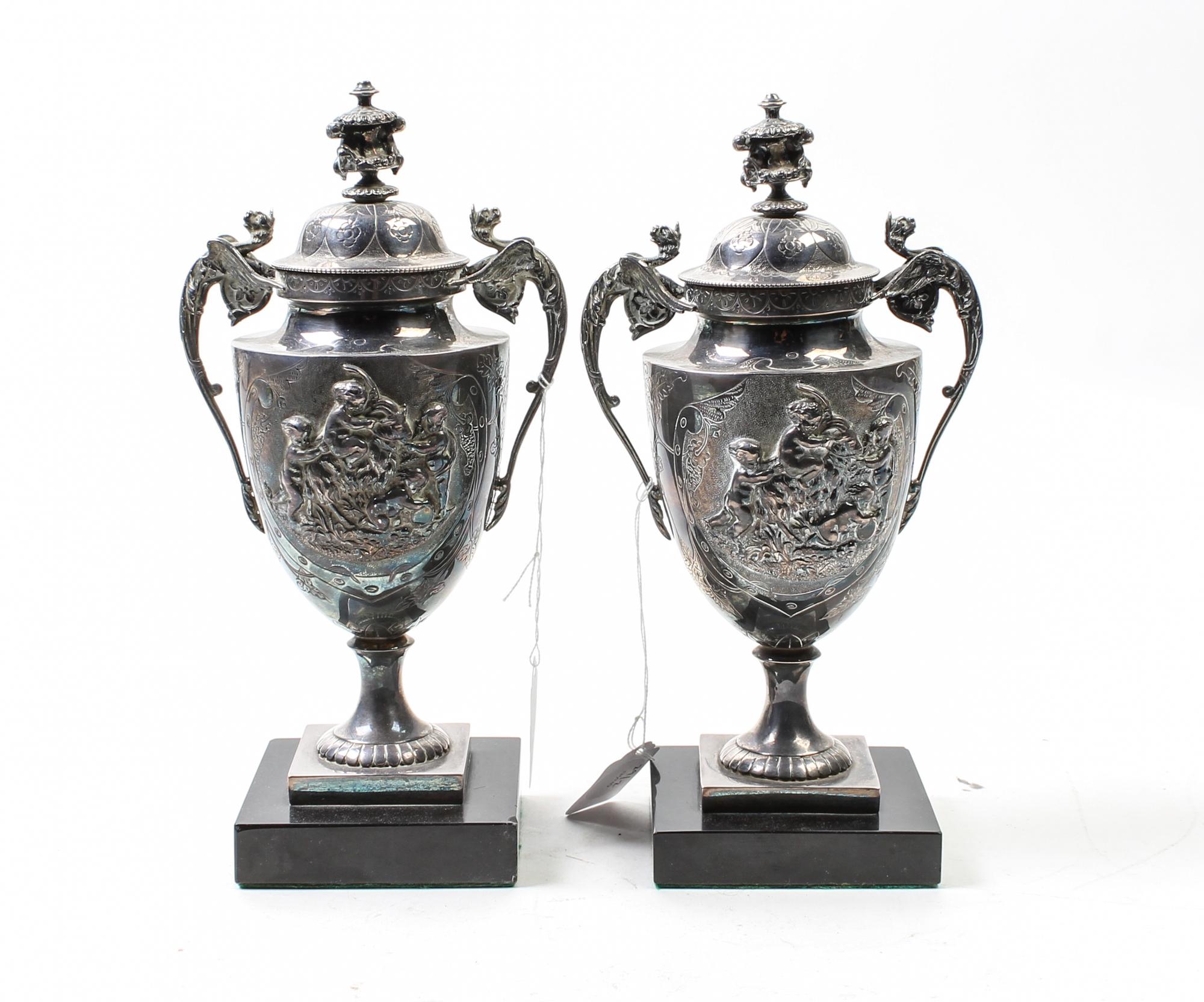 A Pair of Neoclassical Silver-Plate Urns Height of urns 9 3/4 inches. — 19TH/20TH CENTURY