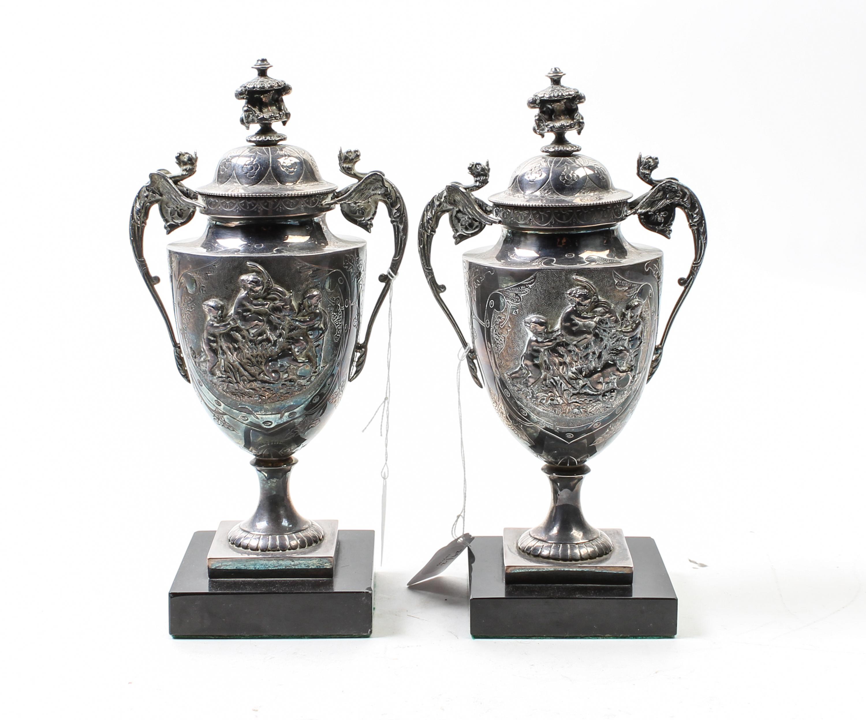 A Pair of Neoclassical Silver-Plate Urns Height of urns 9 3/4 inches. — 19TH/20TH CENTURY