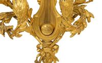 A Pair of French Gilt Bronze Lyre-Form Four-Light Sconces