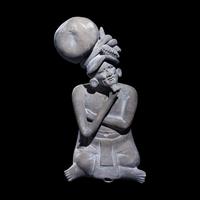 A Maya Seated Scribe