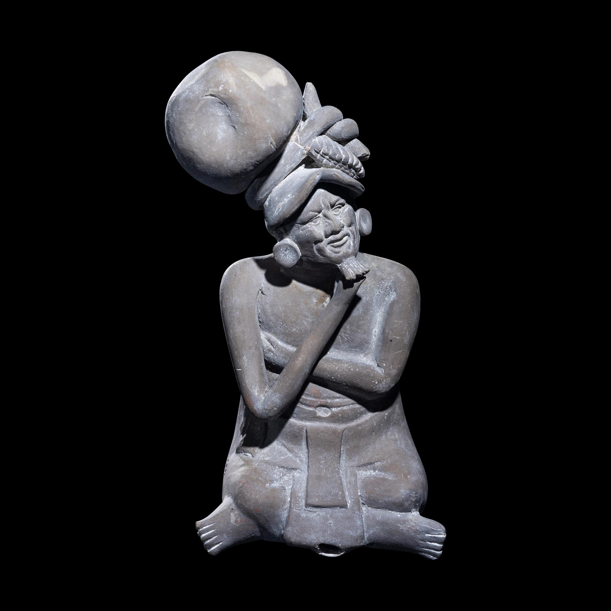 A Maya Seated Scribe