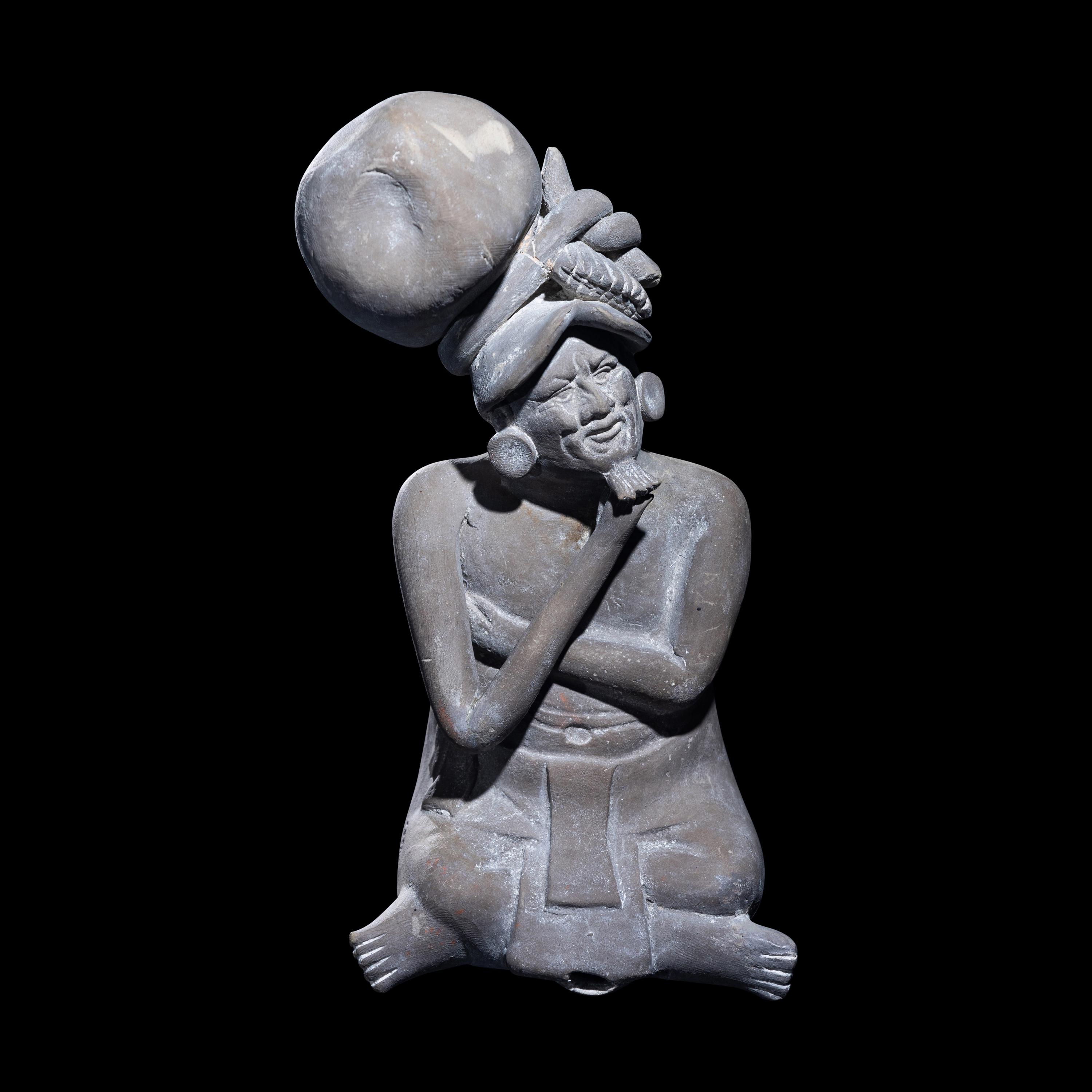 A Maya Seated Scribe