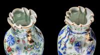 A Matched Pair of Chinese Celadon Ground Famille Rose Porcelain Vases