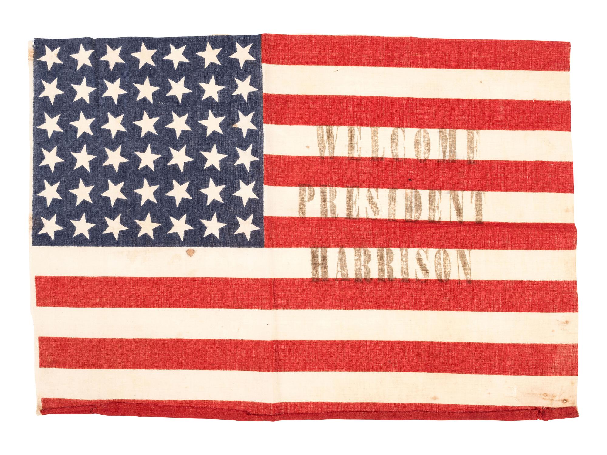 [FLAGS & PATRIOTIC TEXTILES - HARRISON, Benjamin (1833-1901)]. "Welcome President Harrison" parade flag. Ca 1889-1890.