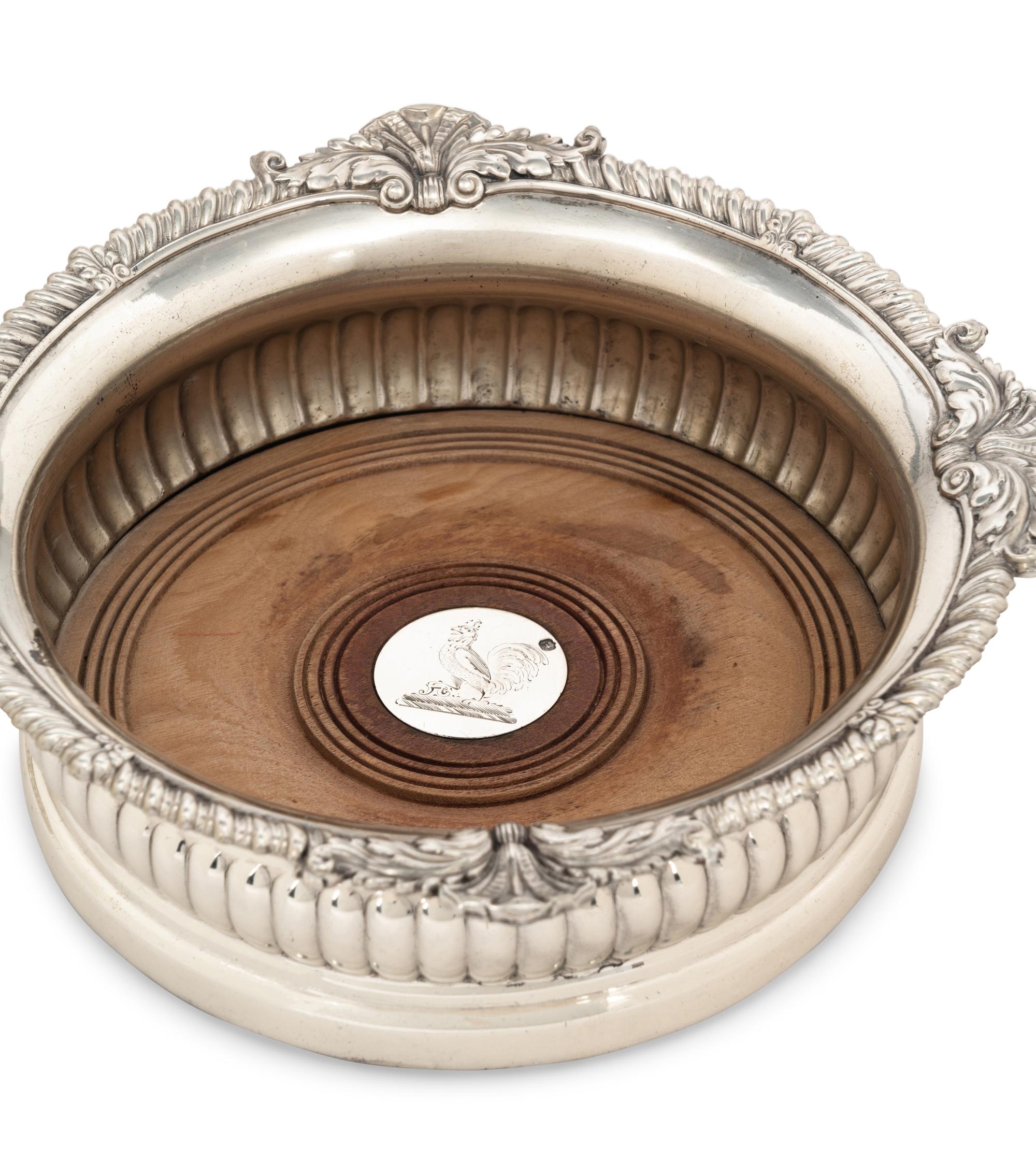 A Pair of Paul Storr Silver Mounted Wine Coasters