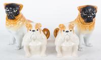 Two Pairs of Glazed Pottery Dogs Height of taller 6 1/2 inches.