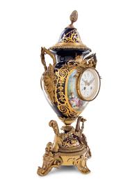 A Gilt Bronze Mounted Sèvres Style Porcelain Urn-Form Clock
