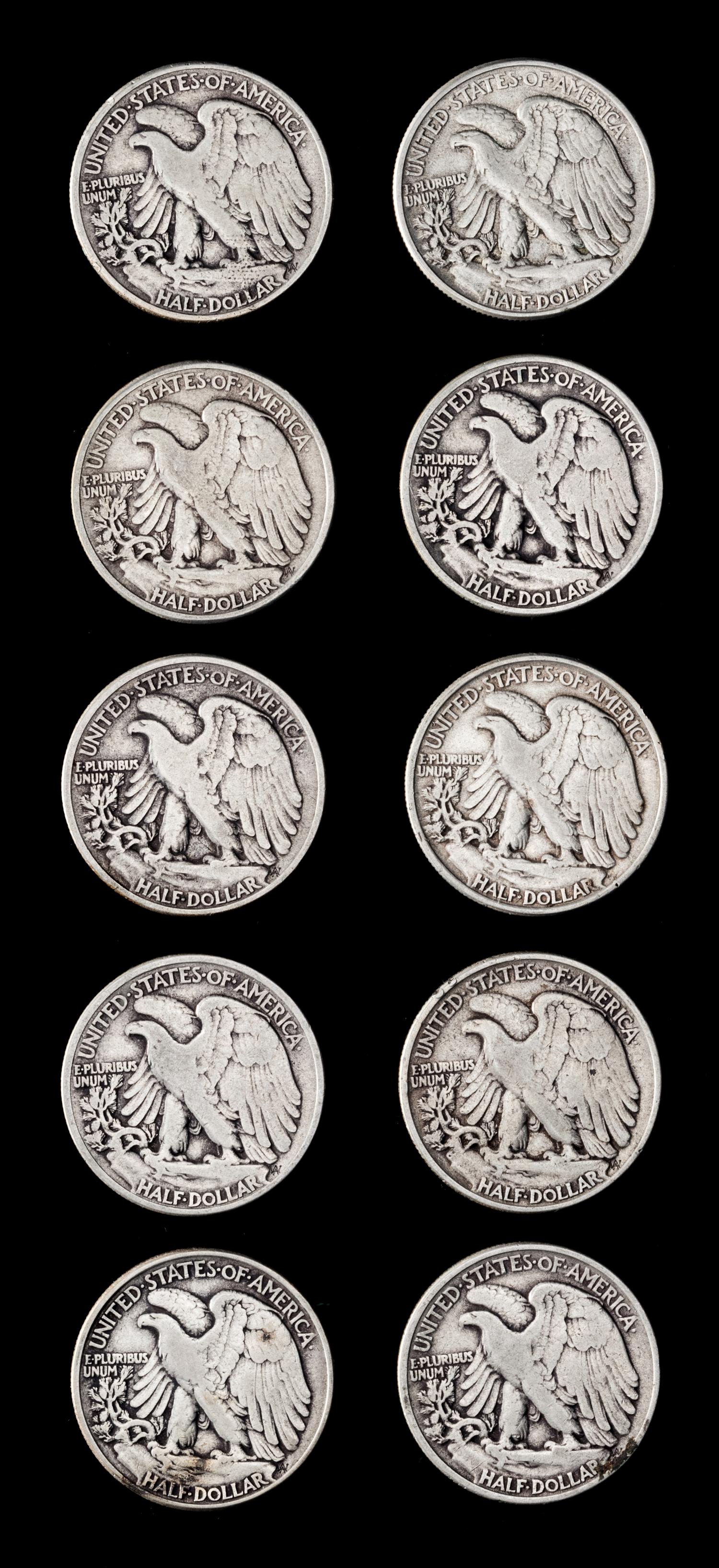 A Collection of Twenty-Eight United States Walking Liberty 50c Coins