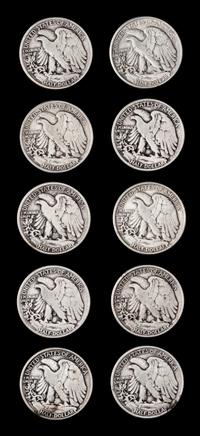 A Collection of Twenty-Eight United States Walking Liberty 50c Coins