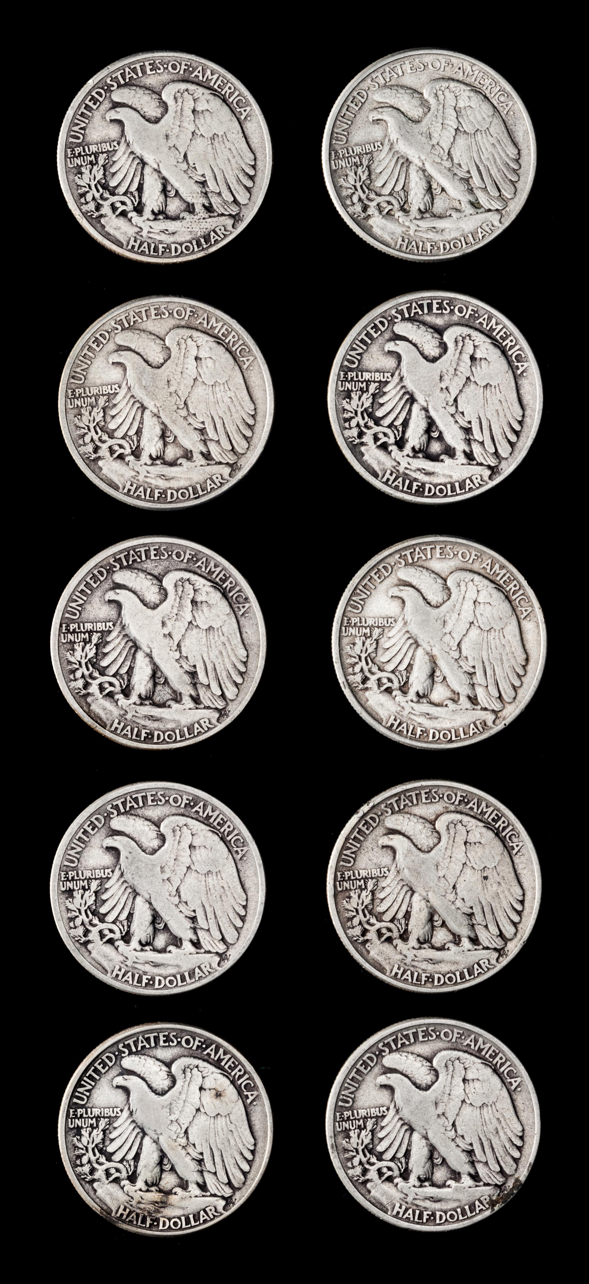 A Collection of Twenty-Eight United States Walking Liberty 50c Coins