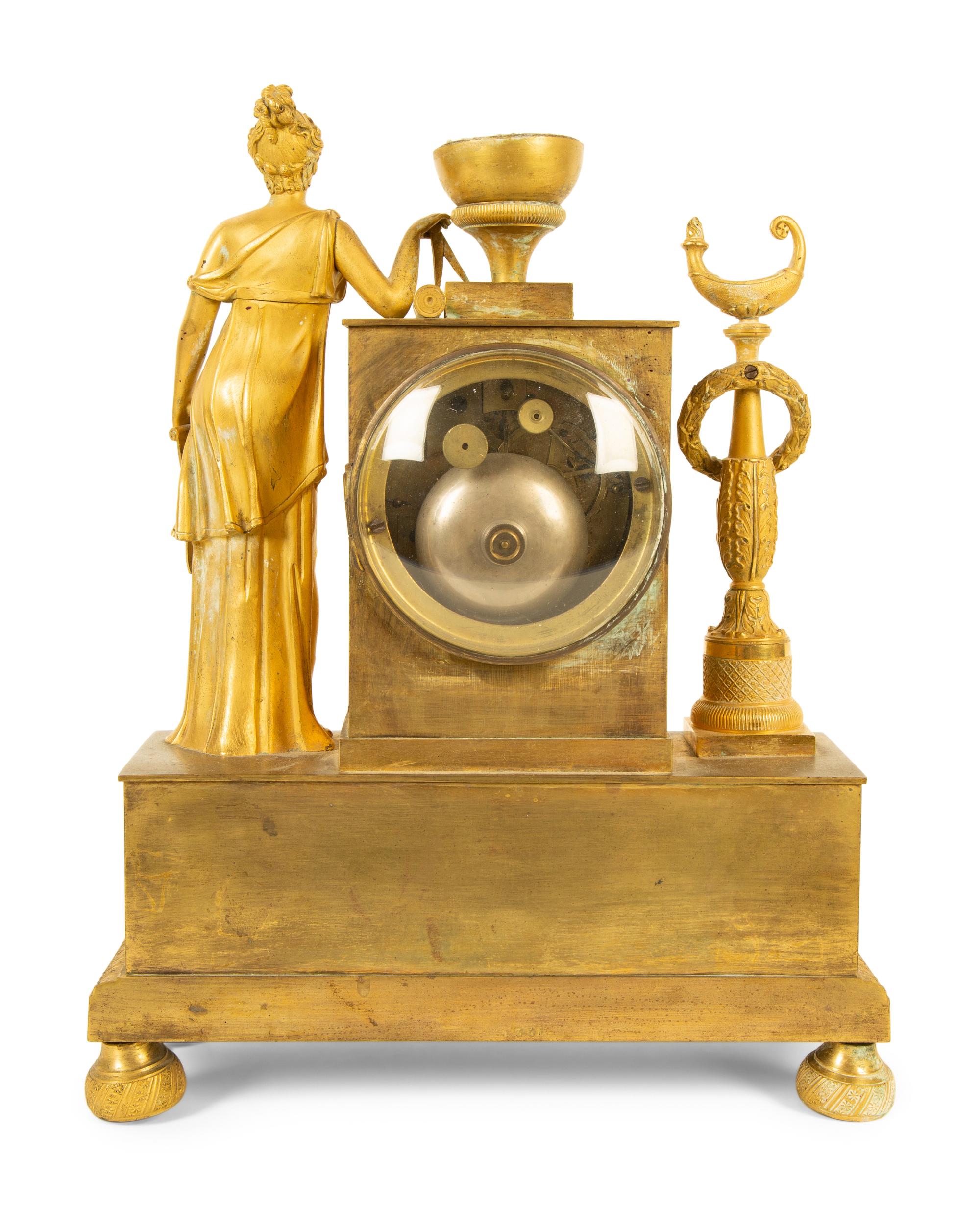 An Empire Gilt Bronze Mantel Clock
