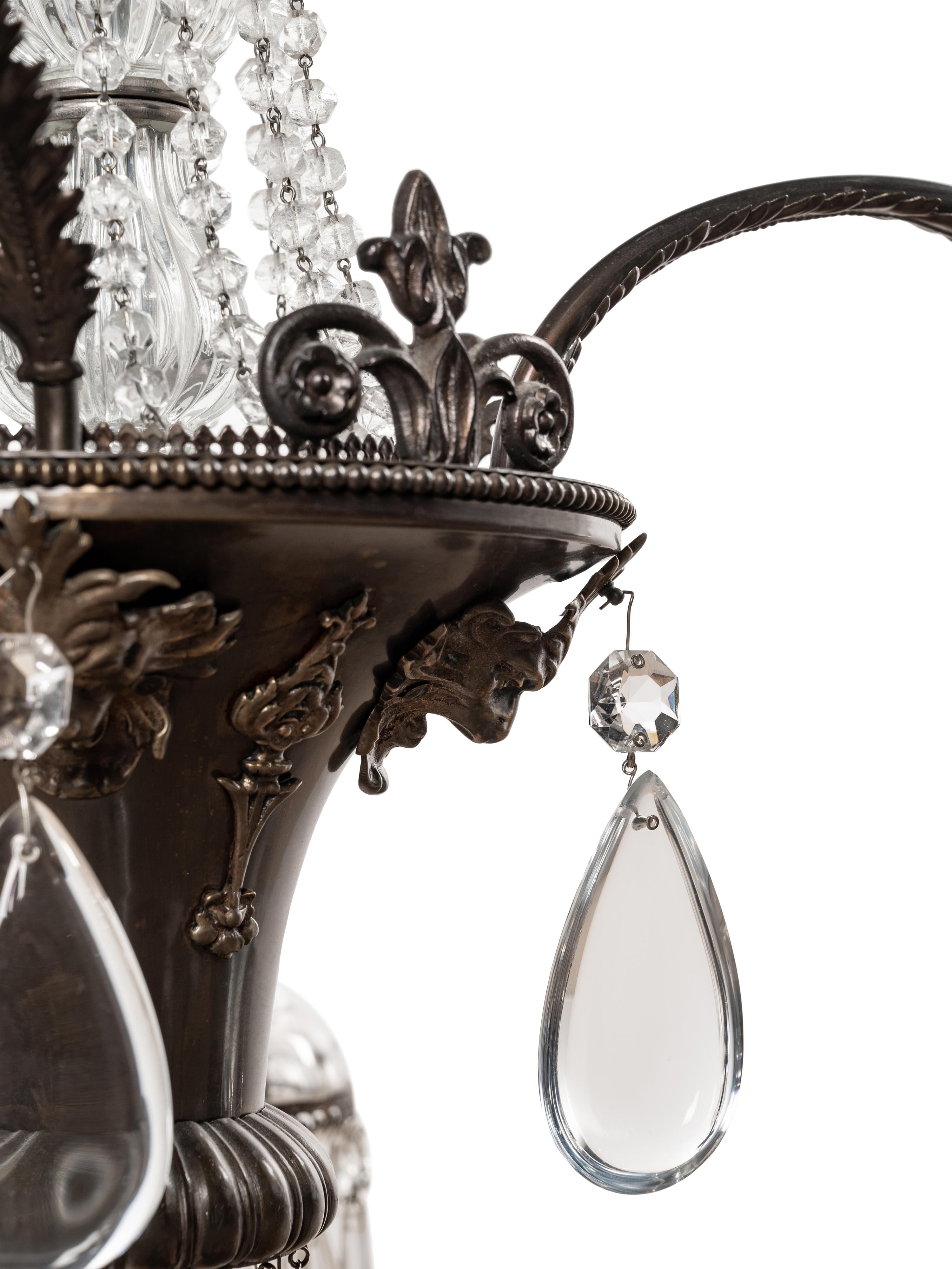 A Continental Bronze and Cut Glass Five-Light Chandelier