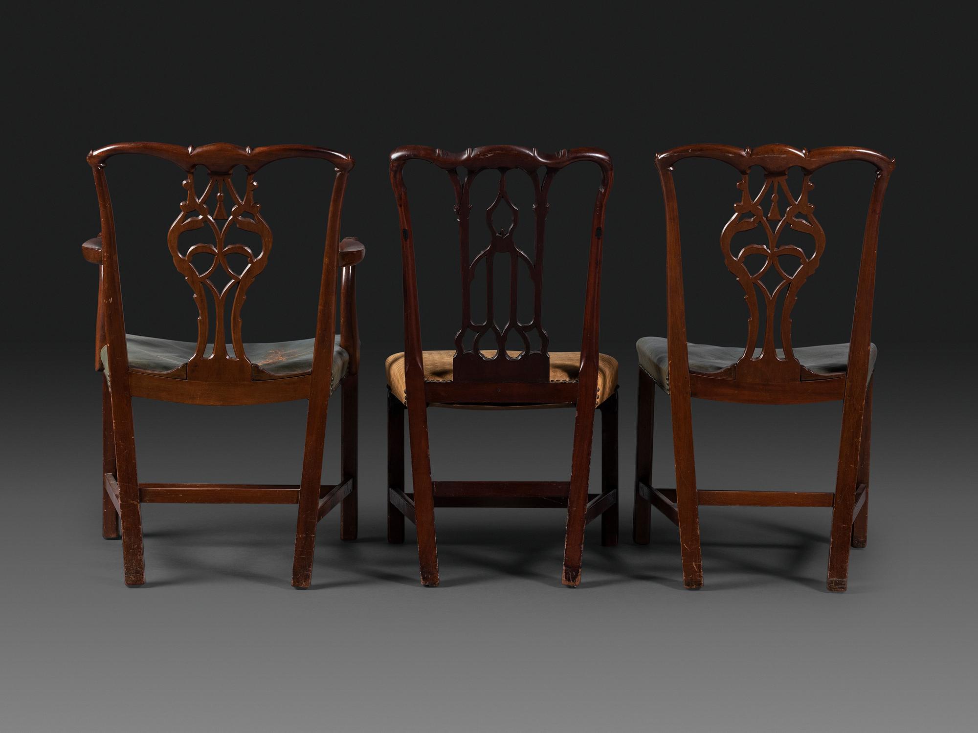 A Set of Six Chippendale Style Carved Mahogany Dining Chairs