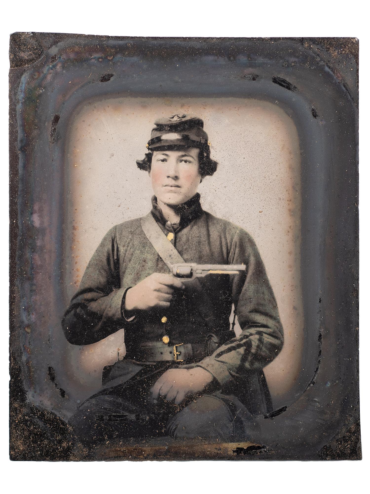[CIVIL WAR]. Sixth plate ambrotype of CSA soldier John Adams, Jr., possibly from Company, B, 16th South Carolina Volunteers, holding a Confederate-made Spiller & Burr revolver, with civilian portrait.