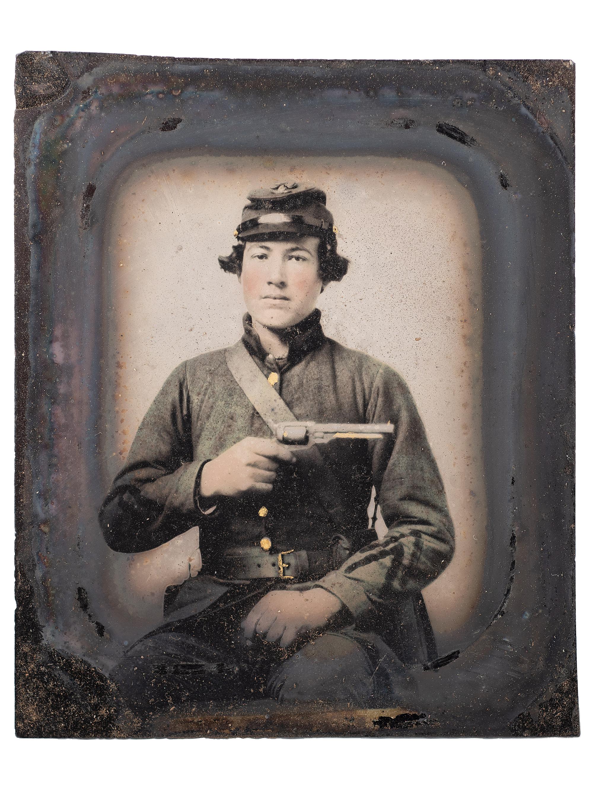 [CIVIL WAR]. Sixth plate ambrotype of CSA soldier John Adams, Jr., possibly from Company, B, 16th South Carolina Volunteers, holding a Confederate-made Spiller & Burr revolver, with civilian portrait.