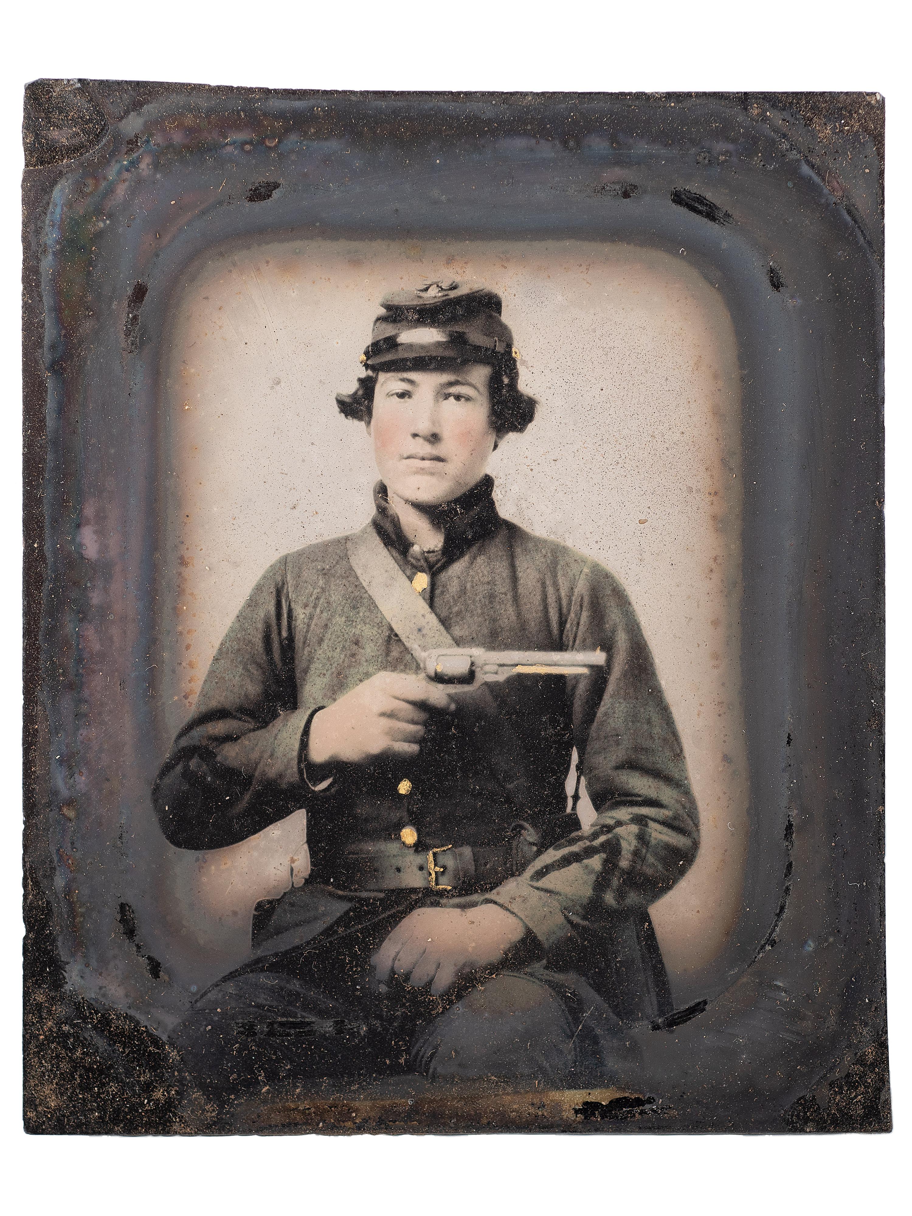 [CIVIL WAR]. Sixth plate ambrotype of CSA soldier John Adams, Jr., possibly from Company, B, 16th South Carolina Volunteers, holding a Confederate-made Spiller & Burr revolver, with civilian portrait.