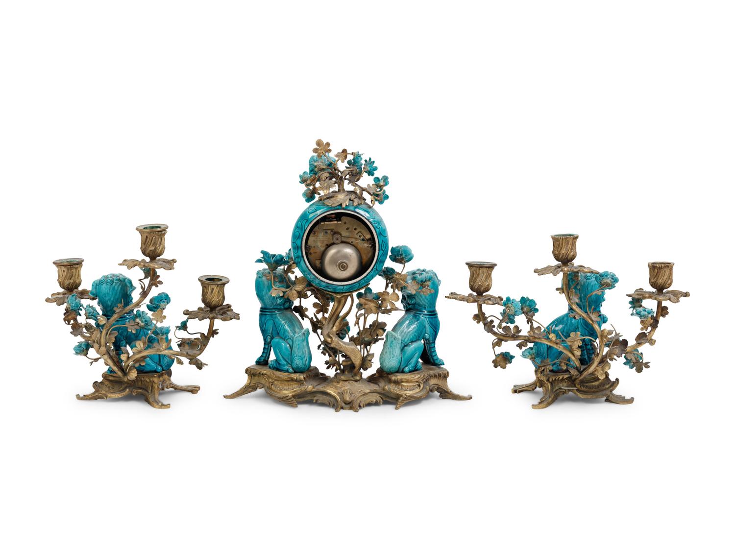 A Louis XV Style Gilt Bronze and Porcelain Clock Garniture
