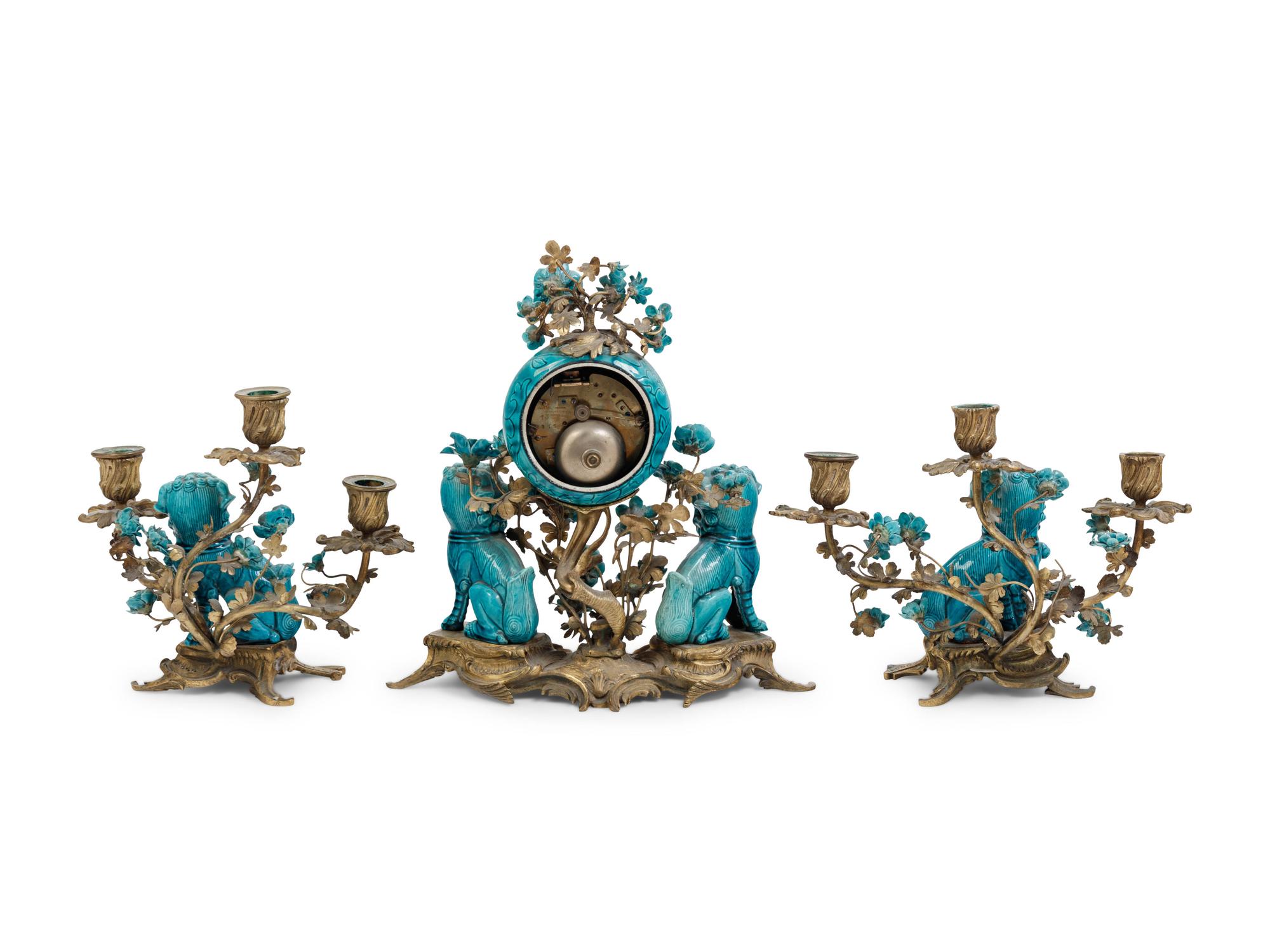 A Louis XV Style Gilt Bronze and Porcelain Clock Garniture
