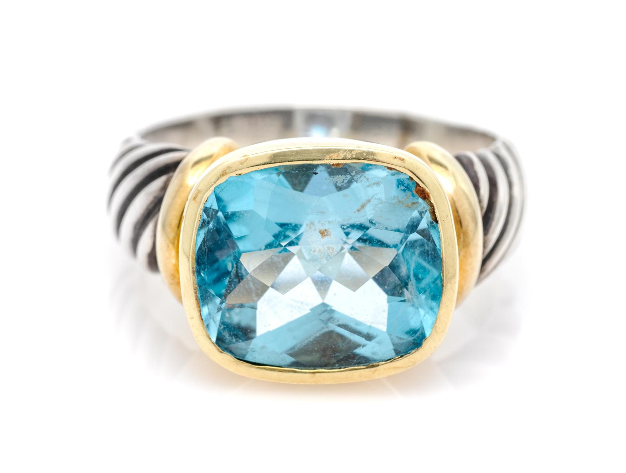 A Sterling Silver, 14 Karat Yellow Gold and Blue Topaz 'Noblesse' Ring, David Yurman, 7.50 dwts.