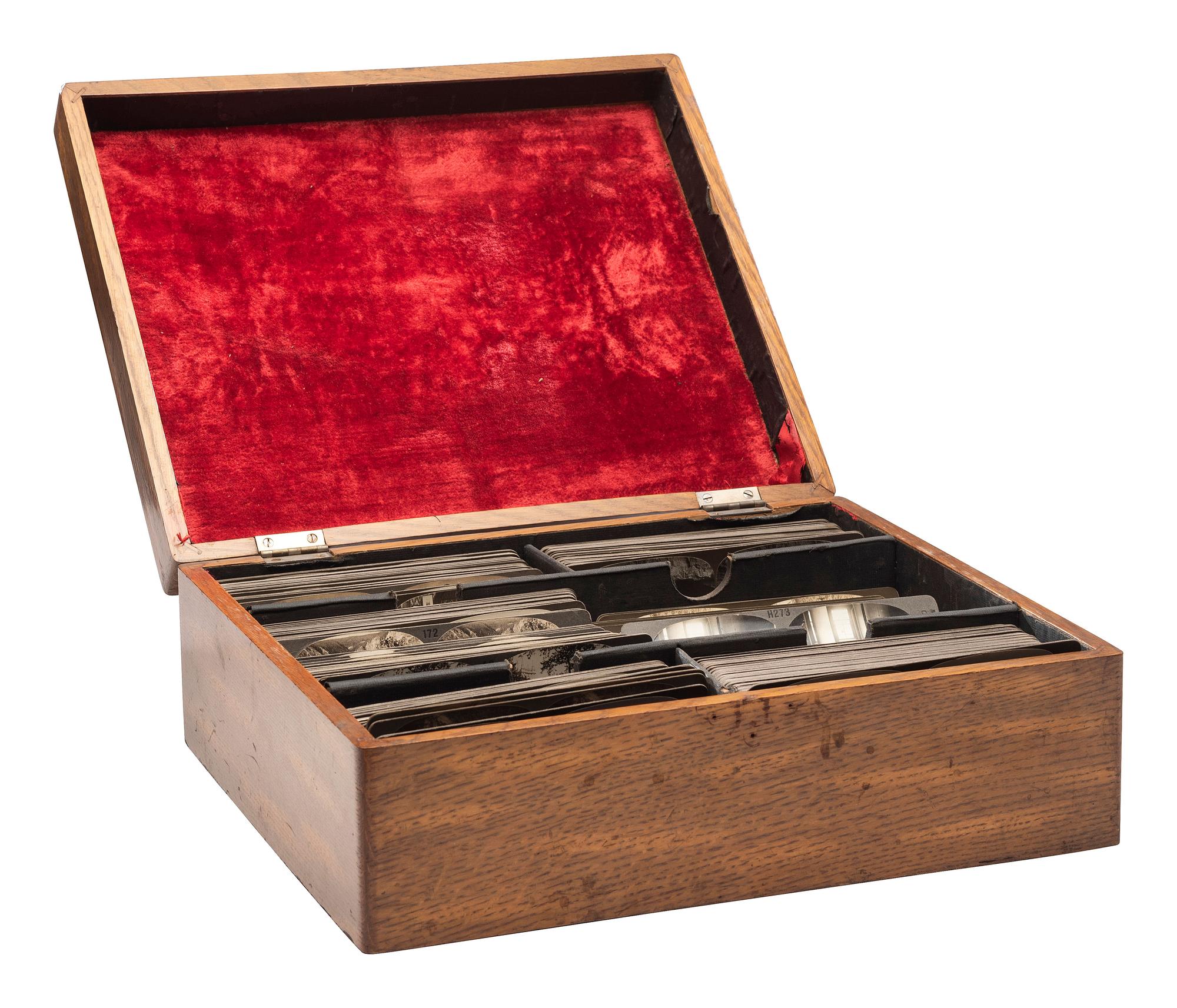 [EARLY PHOTOGRAPHY]. Collection of stereoviews by Keystone and Underwood, several in wooden box.