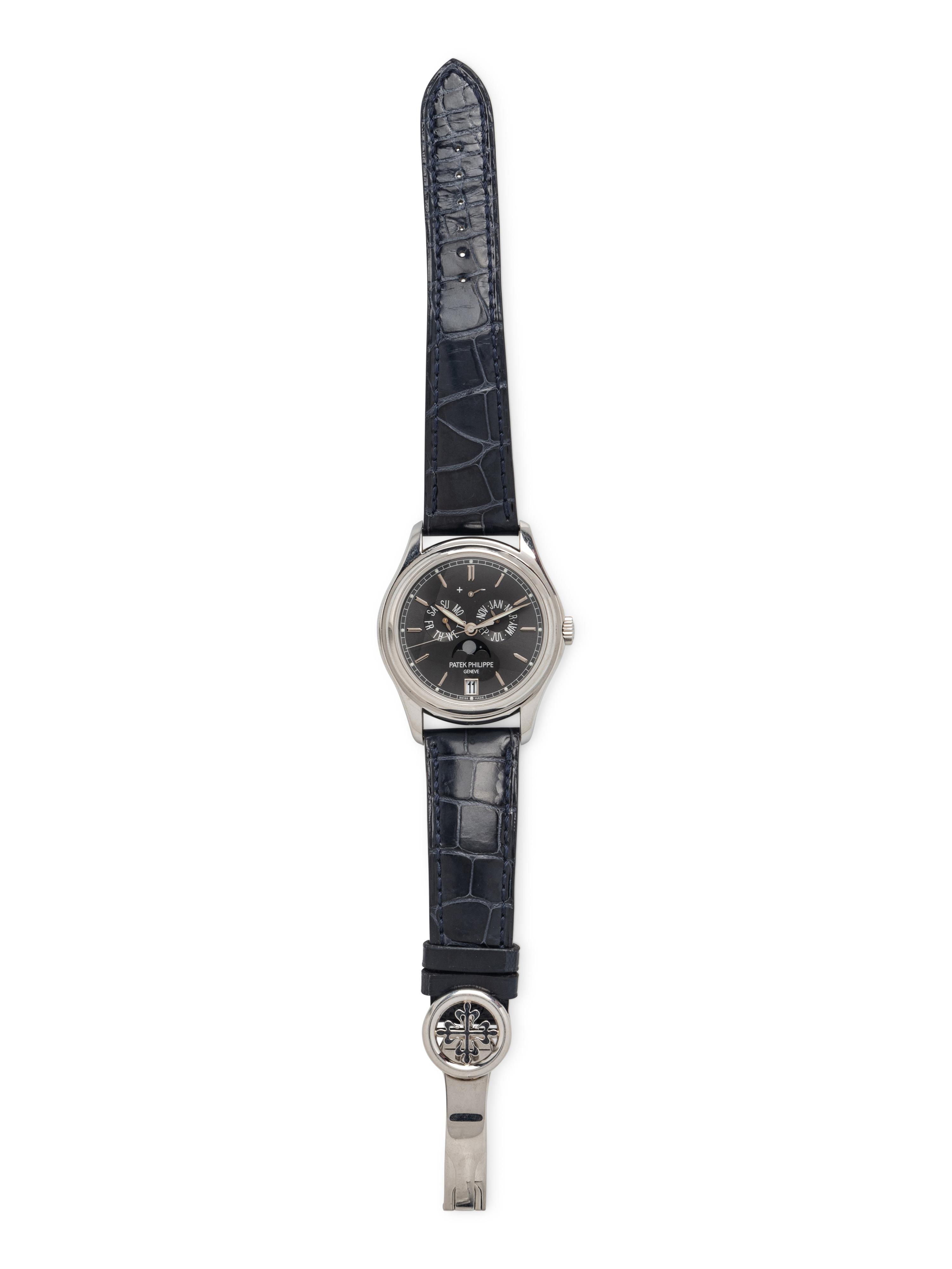 PATEK PHILIPPE, REF. 5146P PLATINUM ANNUAL CALENDAR WITH MOON PHASE WATCH, BOX & PAPERS