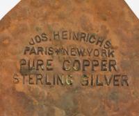 A Joseph Heinrichs Hammered Copper on Silver Creamer and Sugar