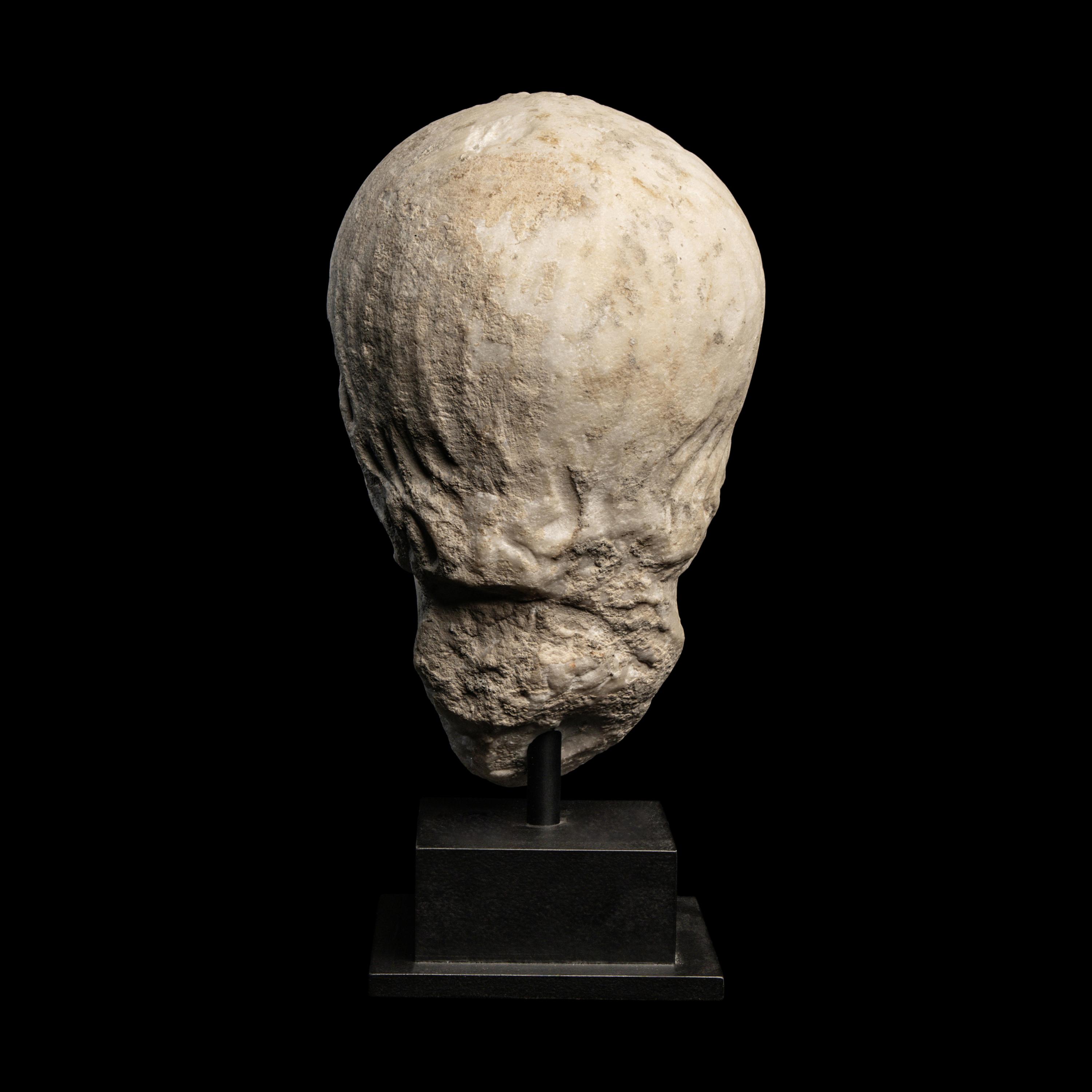 A Roman Marble Portrait Head of a Boy