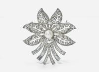 A Platinum and Diamond Flower Brooch