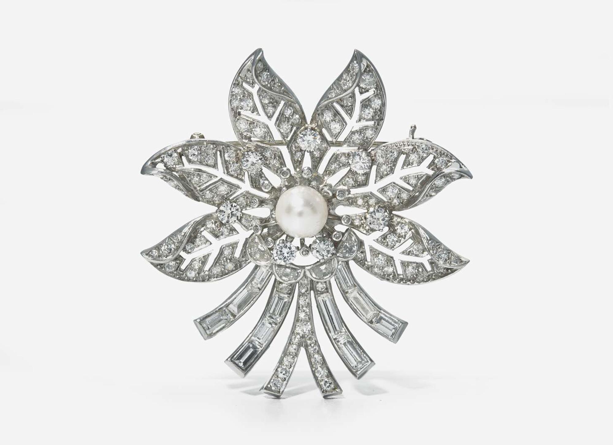 A Platinum and Diamond Flower Brooch